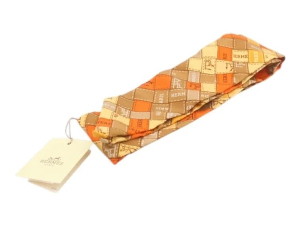 7524 - Hermes Twilly Ribbon Pattern Orange / Brown - NWT